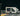 Tarmac Works Mitsubishi Fuso Canter EVA Racing Mobile Display Truck - White